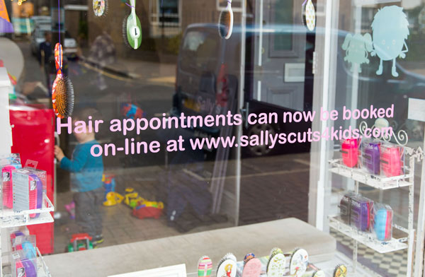 Childrens hairdressing salon window signage